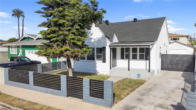 back of house with a garage