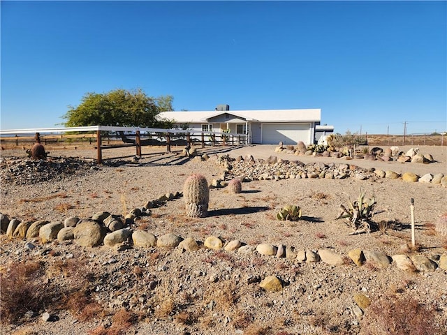 view of yard with a rural view