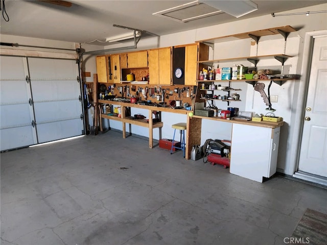 garage featuring a workshop area