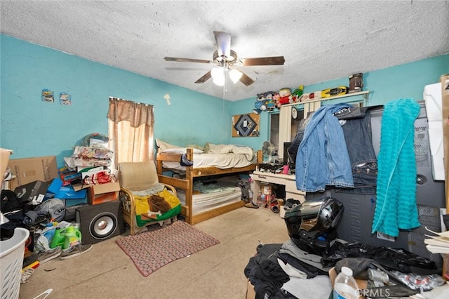 bedroom featuring ceiling fan and a textured ceiling