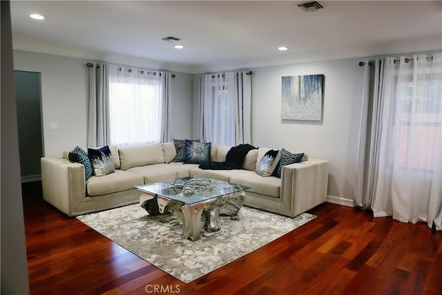 living room featuring dark hardwood / wood-style floors