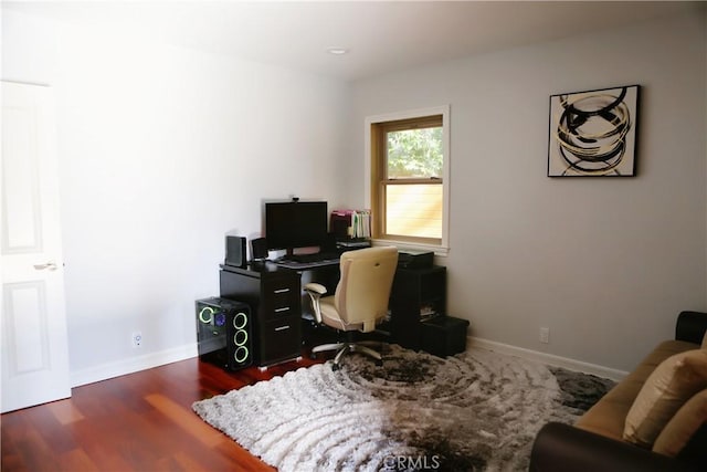 office area with dark hardwood / wood-style flooring