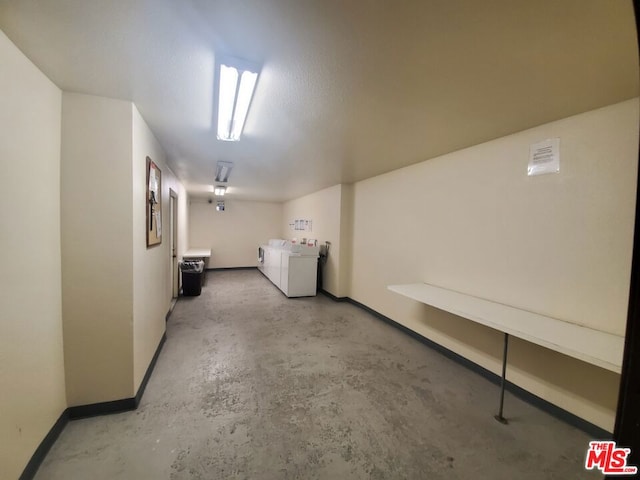 basement with washing machine and clothes dryer