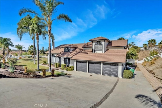 view of front of property with a garage