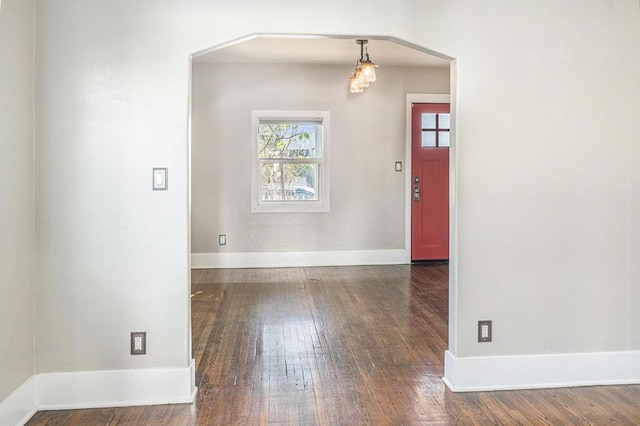 foyer entrance featuring dark hardwood / wood-style floors