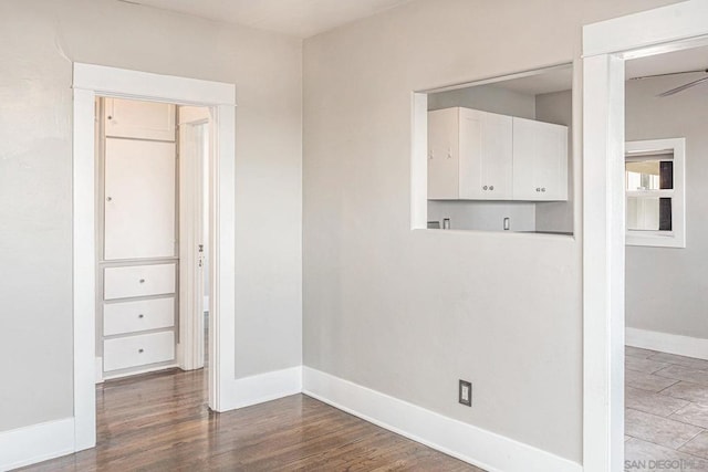 empty room featuring hardwood / wood-style floors and ceiling fan