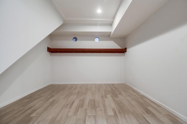 bonus room with light hardwood / wood-style floors