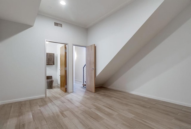 bonus room featuring light wood-type flooring