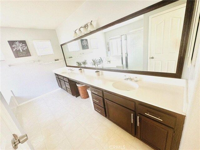 bathroom featuring vanity and a wealth of natural light