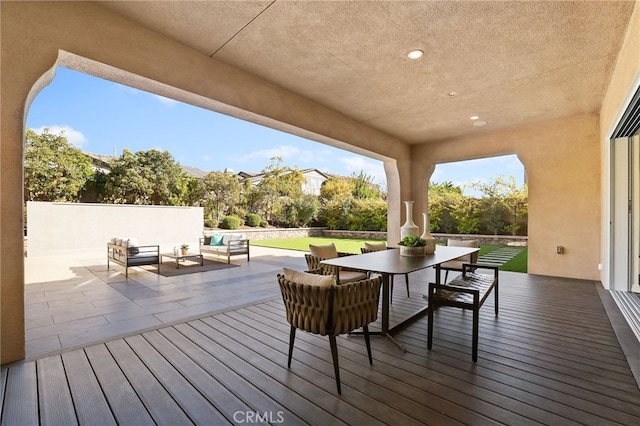 deck with outdoor lounge area