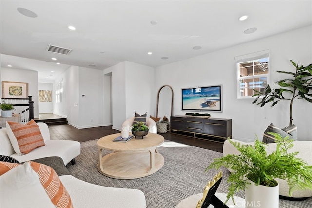 living room featuring dark hardwood / wood-style floors