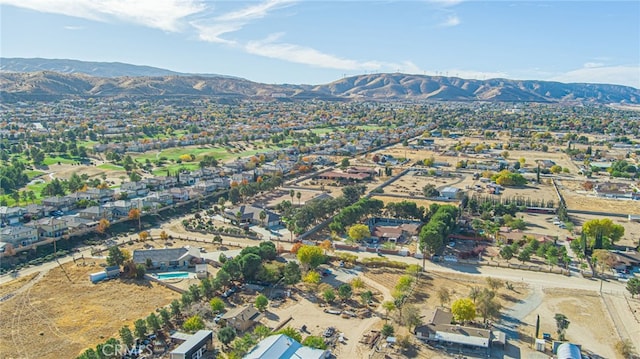 drone / aerial view featuring a mountain view