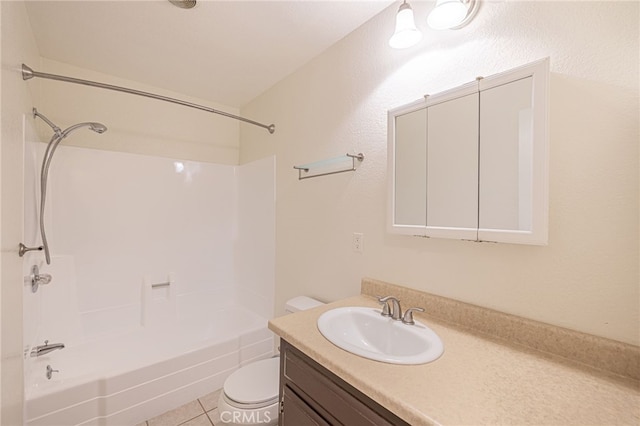 full bathroom with tile patterned floors, vanity, toilet, and tub / shower combination