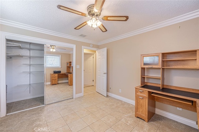 unfurnished office with a textured ceiling, ceiling fan, crown molding, and light tile patterned flooring