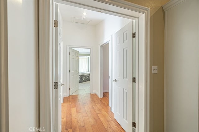 hallway featuring light wood-type flooring