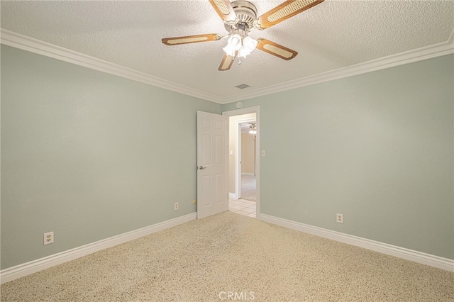 unfurnished room with ceiling fan, a textured ceiling, and ornamental molding