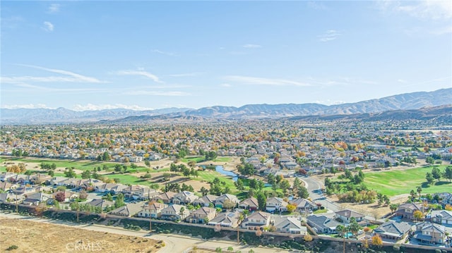 drone / aerial view featuring a mountain view