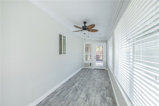 unfurnished sunroom with ceiling fan and lofted ceiling