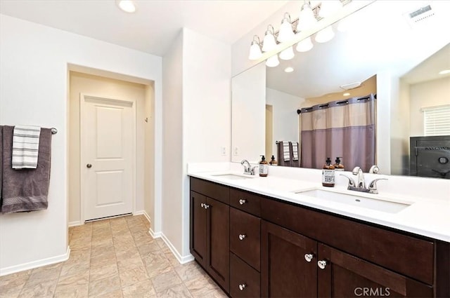 bathroom featuring vanity