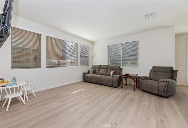 living room featuring light wood-type flooring