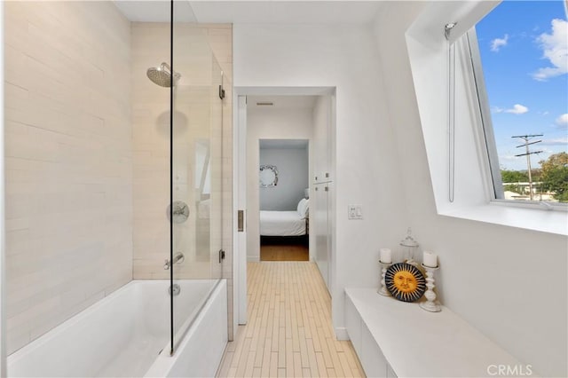 bathroom featuring plus walk in shower