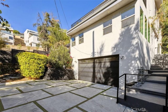 exterior space featuring a garage