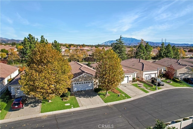 drone / aerial view featuring a mountain view