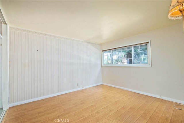 unfurnished room featuring light hardwood / wood-style flooring