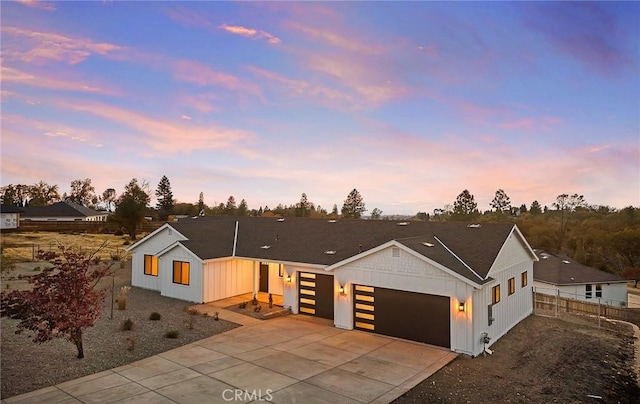 view of front of property with a garage