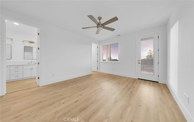 interior space featuring ceiling fan and light hardwood / wood-style flooring