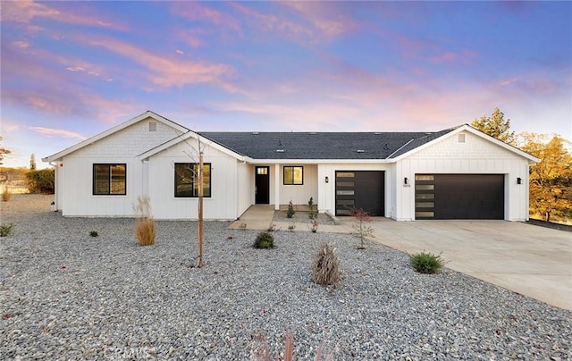 modern farmhouse with a garage