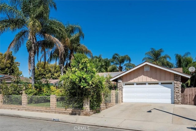 view of front of property with a garage