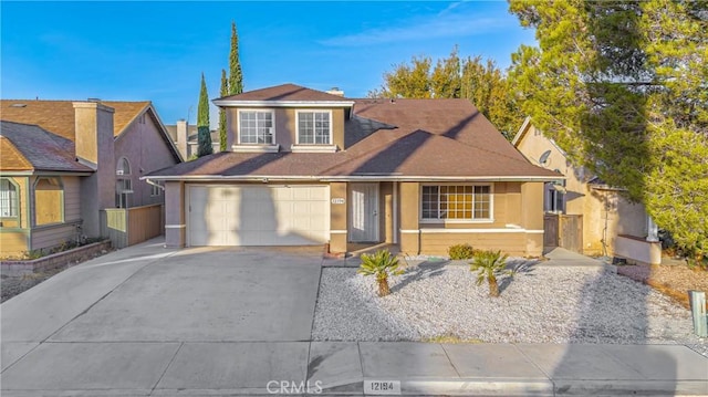 view of front of property featuring a garage