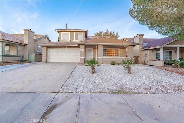 view of front of property featuring a garage