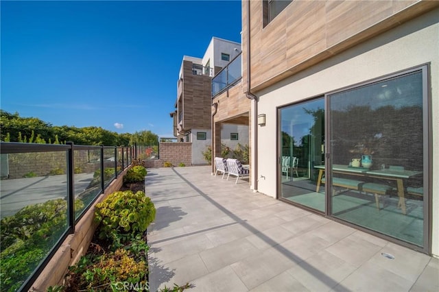 view of patio / terrace with a balcony