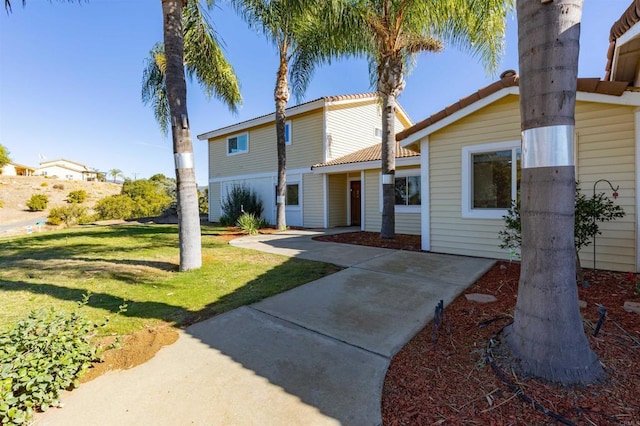 view of front of house with a front lawn