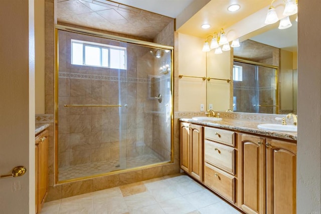 bathroom with vanity and an enclosed shower