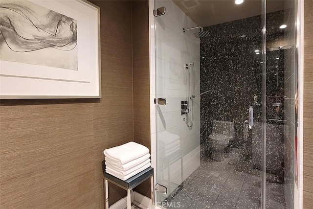 bathroom featuring an enclosed shower