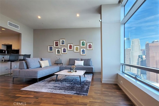 living room with dark wood-type flooring