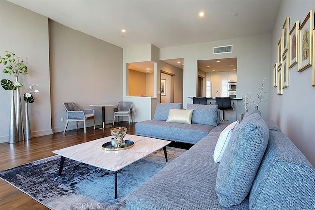 living room with dark wood-type flooring