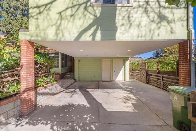 exterior space featuring a carport