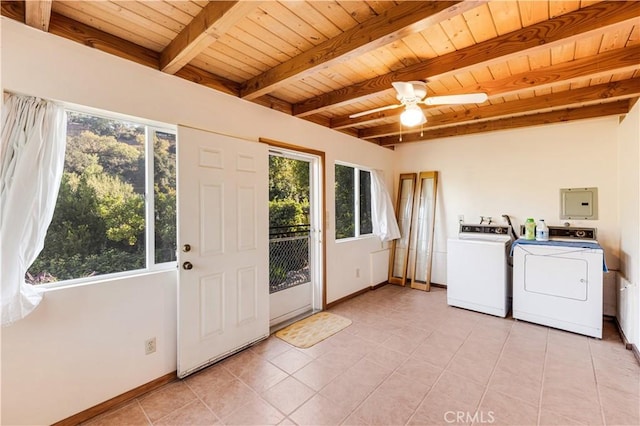 washroom with plenty of natural light, washer and dryer, light tile patterned floors, and wooden ceiling