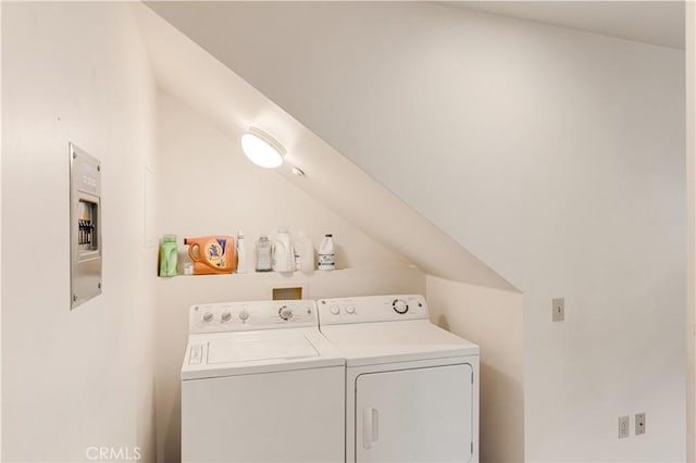 laundry area with washing machine and dryer