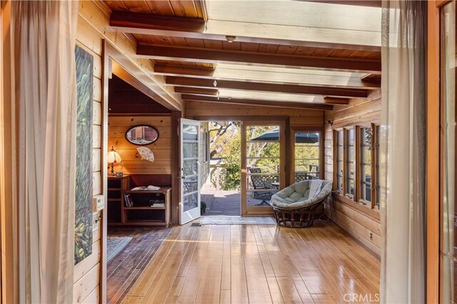 interior space with beamed ceiling and wood ceiling