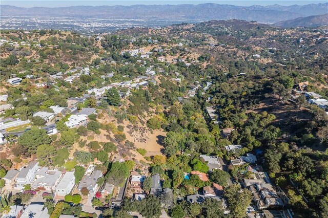 drone / aerial view featuring a mountain view