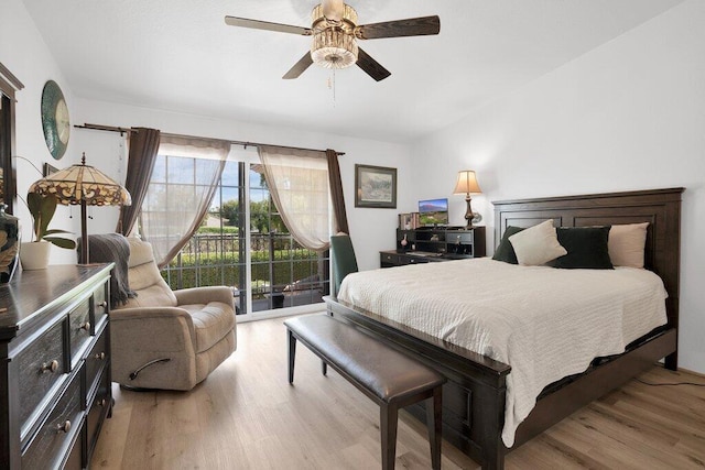 bedroom with access to exterior, light wood-type flooring, and ceiling fan