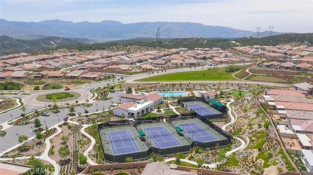 birds eye view of property featuring a mountain view