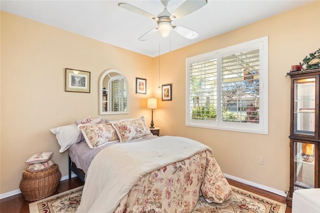 bedroom featuring wood-type flooring and ceiling fan