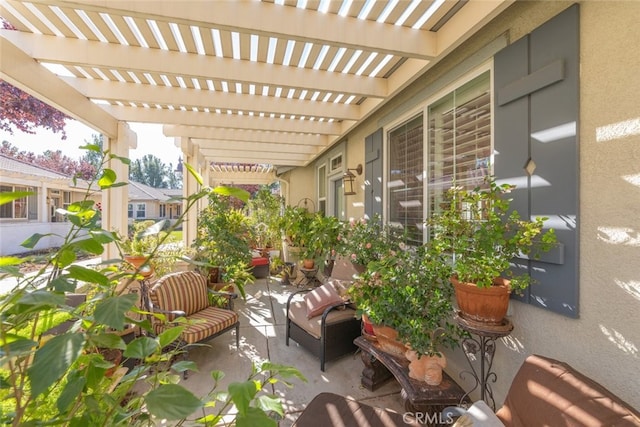 balcony with a pergola and an outdoor hangout area