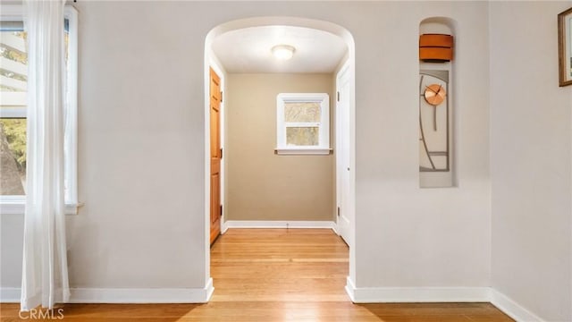 corridor featuring light hardwood / wood-style floors